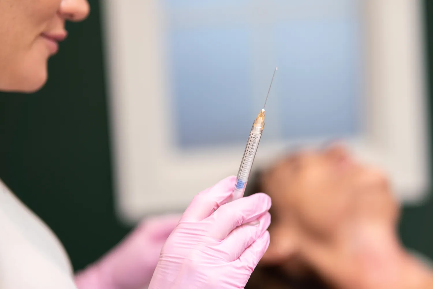 A hands-on facial treatment in progress